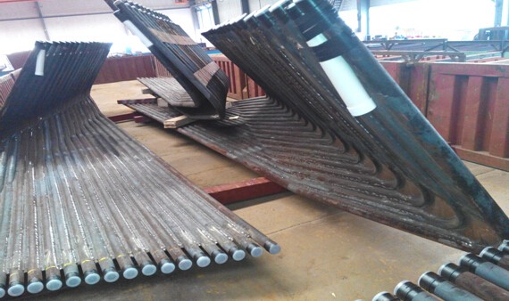 膜式水冷壁管排|材質(zhì)：SA-210C規(guī)格：63.5×7.5 4根一排，鱗片寬度12.7mm厚度6mm管排總長度12米，內(nèi)螺紋8個(gè)頭） 管材需正偏差，帶500米密封